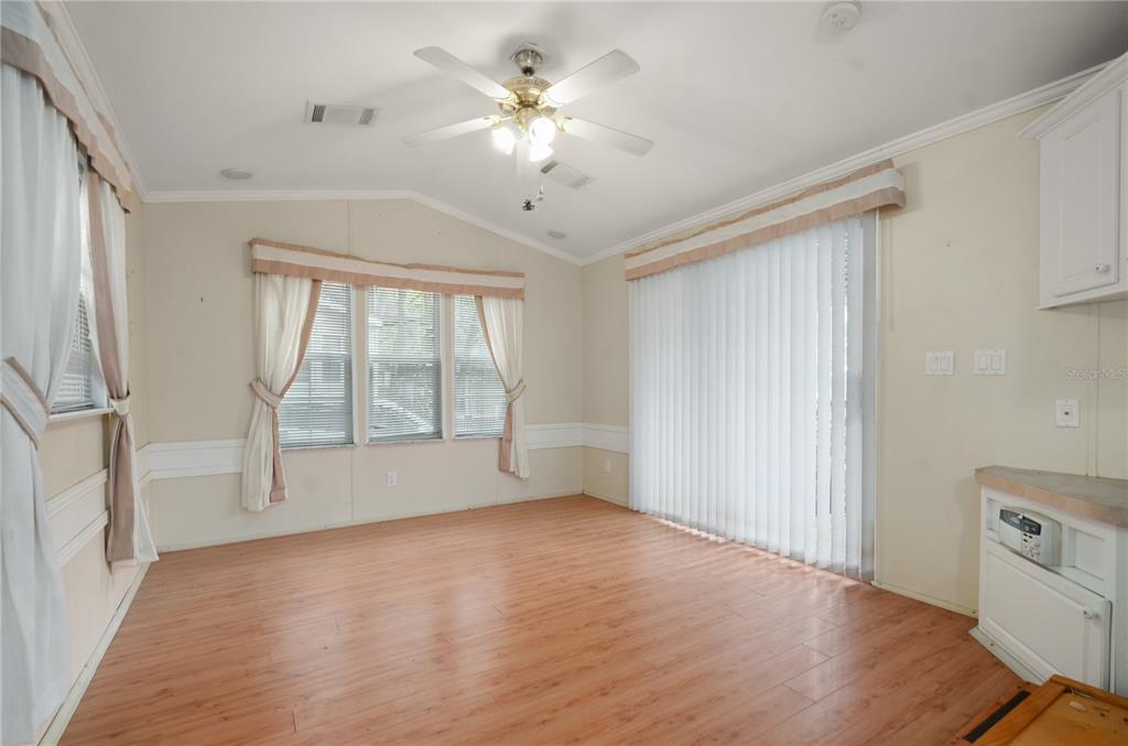 3000 Clarcona Road, Unit 1218 Apopka, FL 32703 - Photo 9 of 22 a view of an empty room with a window