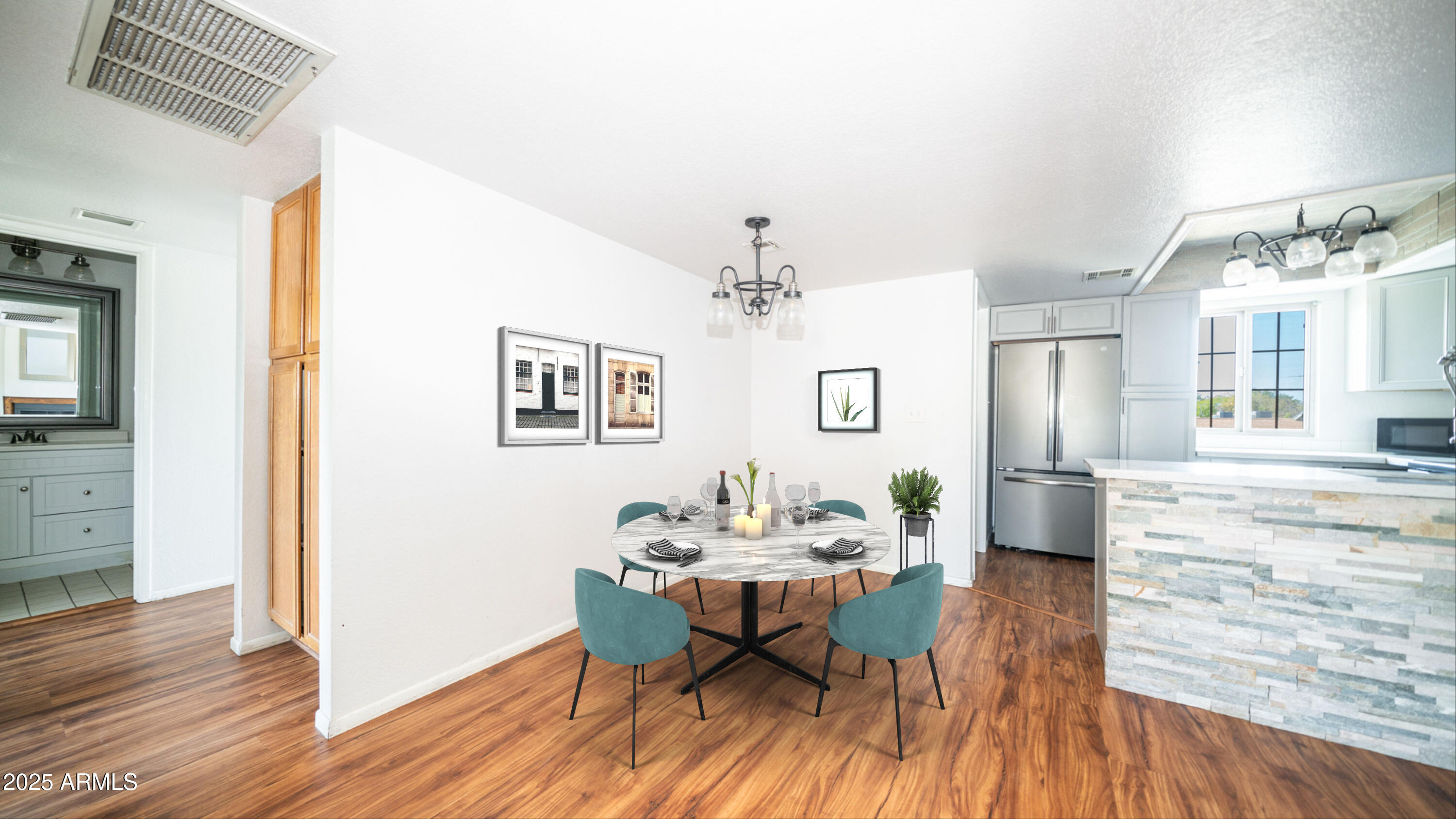 2020 West Union Hills Drive, Unit 246 Phoenix, AZ 85027 - Photo 2 of 23 a view of a dining room with furniture and wooden floor