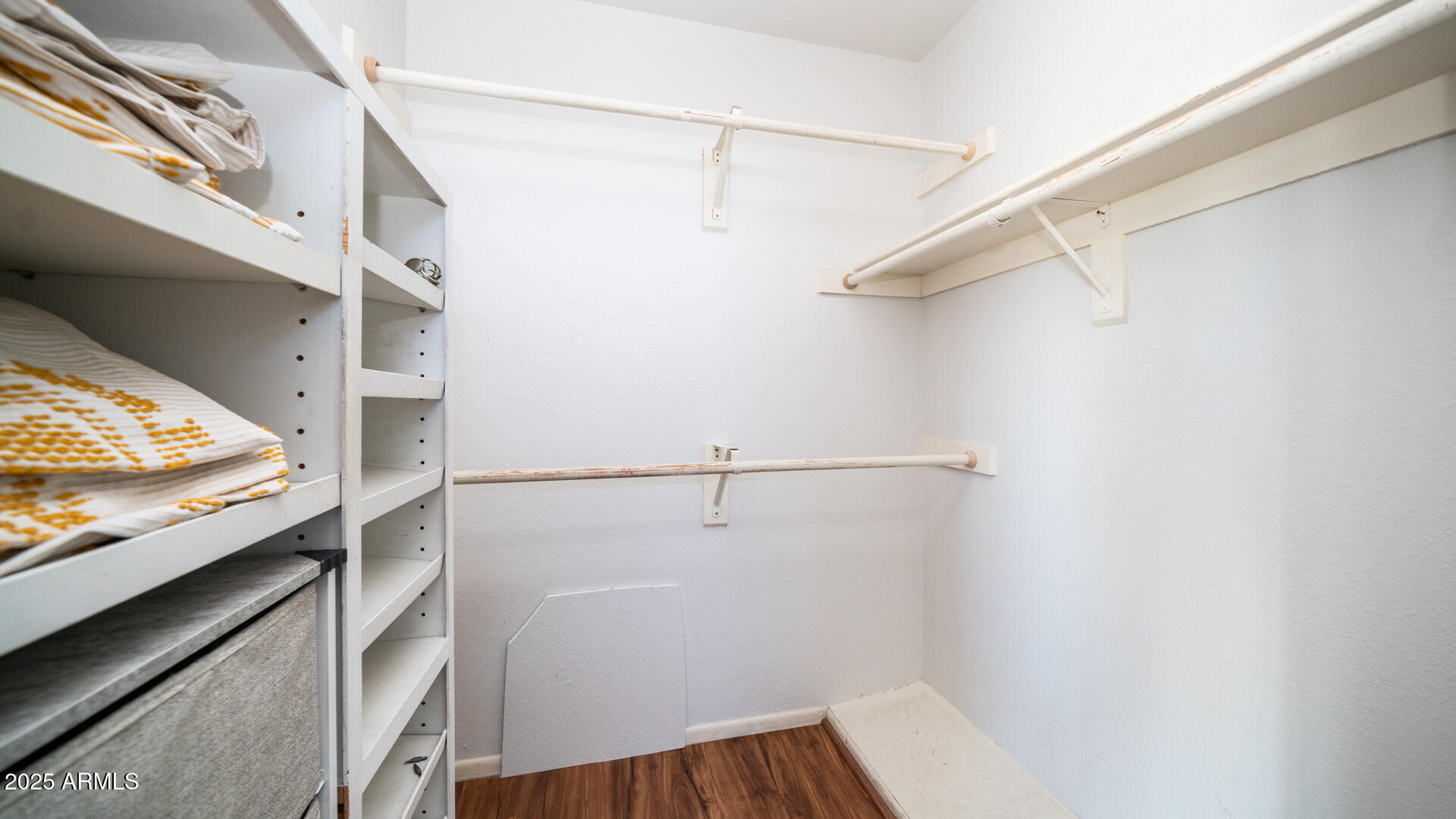 2020 West Union Hills Drive, Unit 246 Phoenix, AZ 85027 - Photo 22 of 23 a view of walk in closet with clothes and shoes