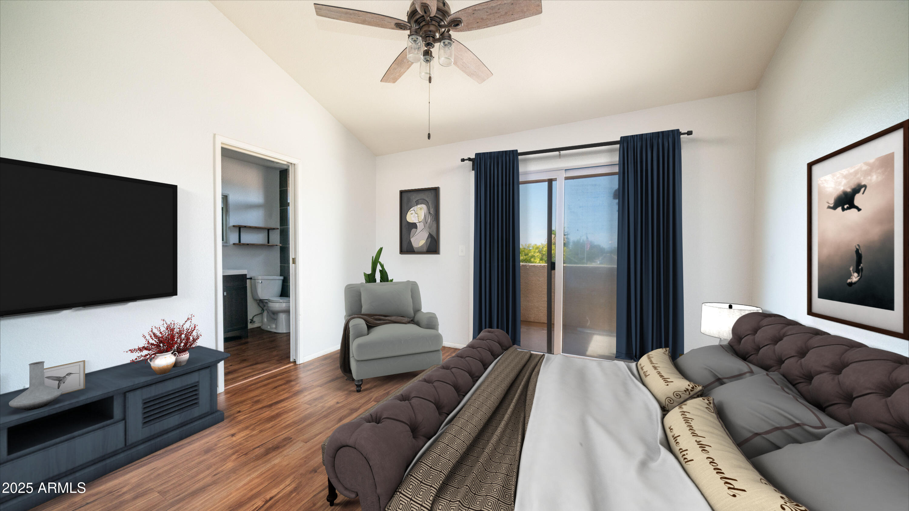 2020 West Union Hills Drive, Unit 246 Phoenix, AZ 85027 - Photo 4 of 23 a bedroom with furniture and a flat screen tv