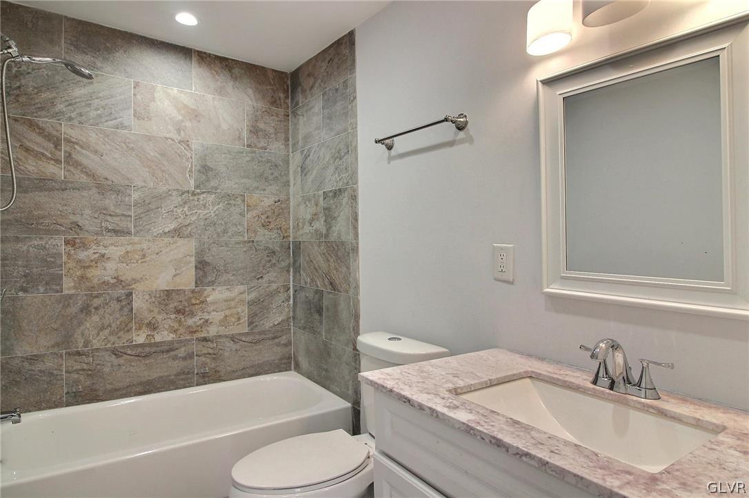 2270 Long Pond Road Long Pond, PA 18334 - Photo 17 of 35 a bathroom with a granite countertop sink toilet and shower