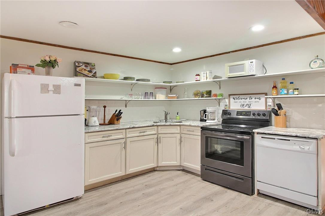 2270 Long Pond Road Long Pond, PA 18334 - Photo 24 of 35 a kitchen with a white cabinets and white appliances