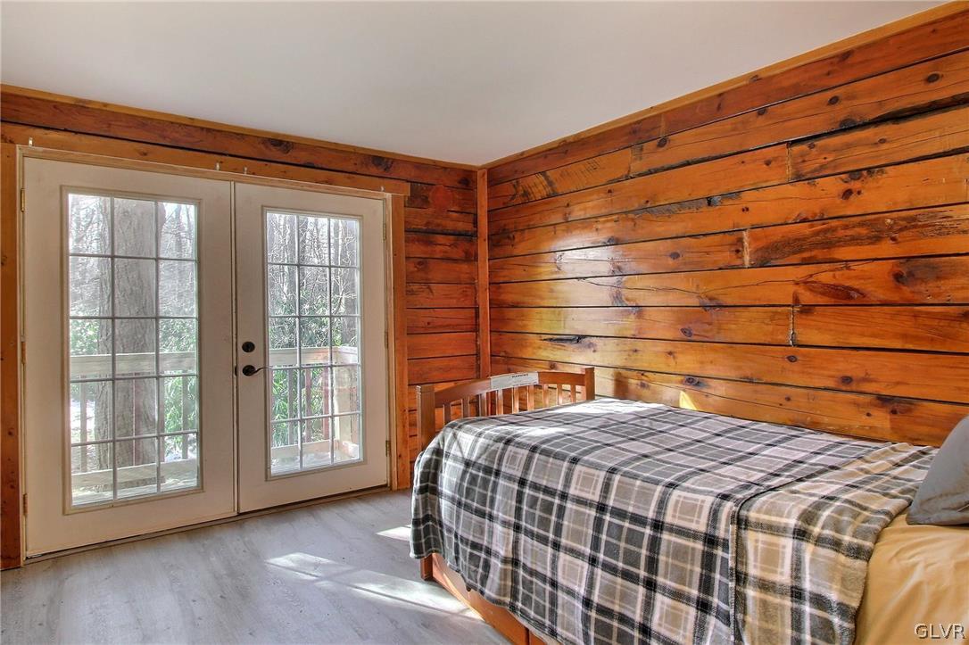 2270 Long Pond Road Long Pond, PA 18334 - Photo 31 of 35 a bedroom with a bed and a window