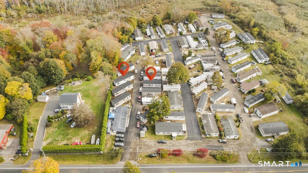 55 Sugar Street, Unit 14 Newtown, CT 06470 - Photo 18 of 18 a city view with tall buildings