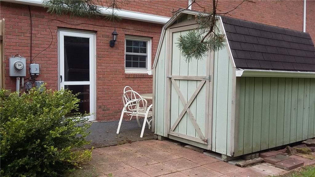 4882 Lucerne Road Indiana, PA 15701 - Photo 2 of 13 Back entrance, patio, shed