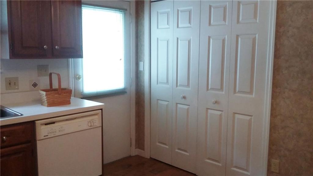4882 Lucerne Road Indiana, PA 15701 - Photo 5 of 13 Kitchen showing back door to patio and doors to laundry area.