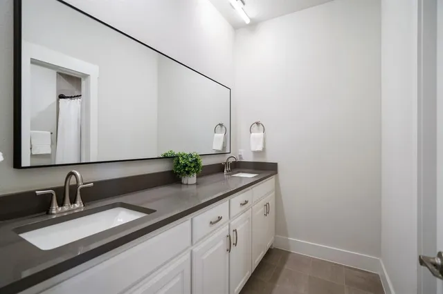 a bedroom with a bed and a cabinets