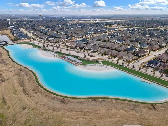 an aerial view of a building with outdoor space