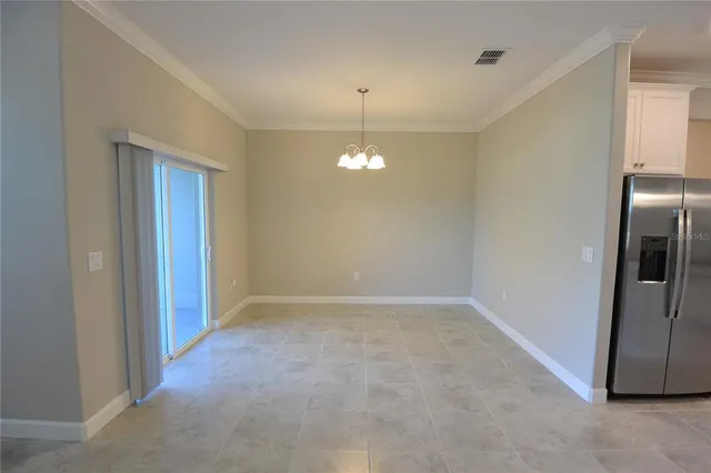 a view of a room with a hallway