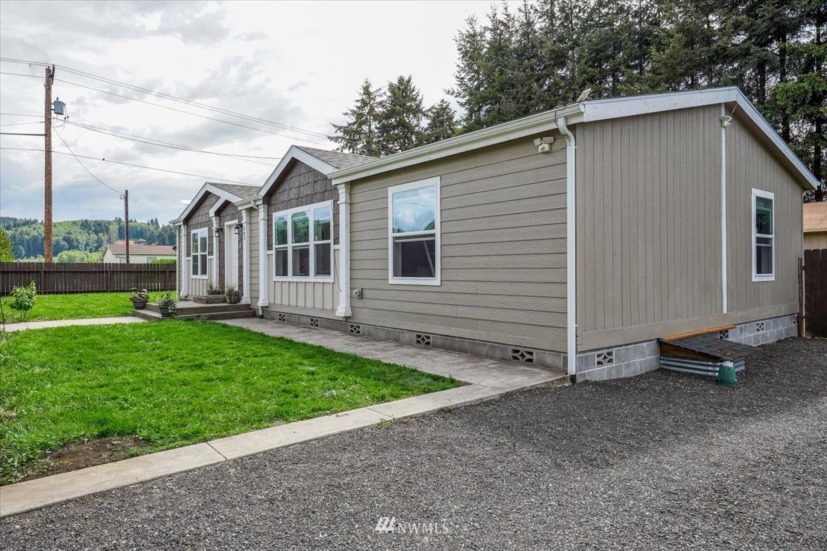 503 Maple Street Pe Ell, WA 98572 - Photo 1 of 27 a view of a house with a yard