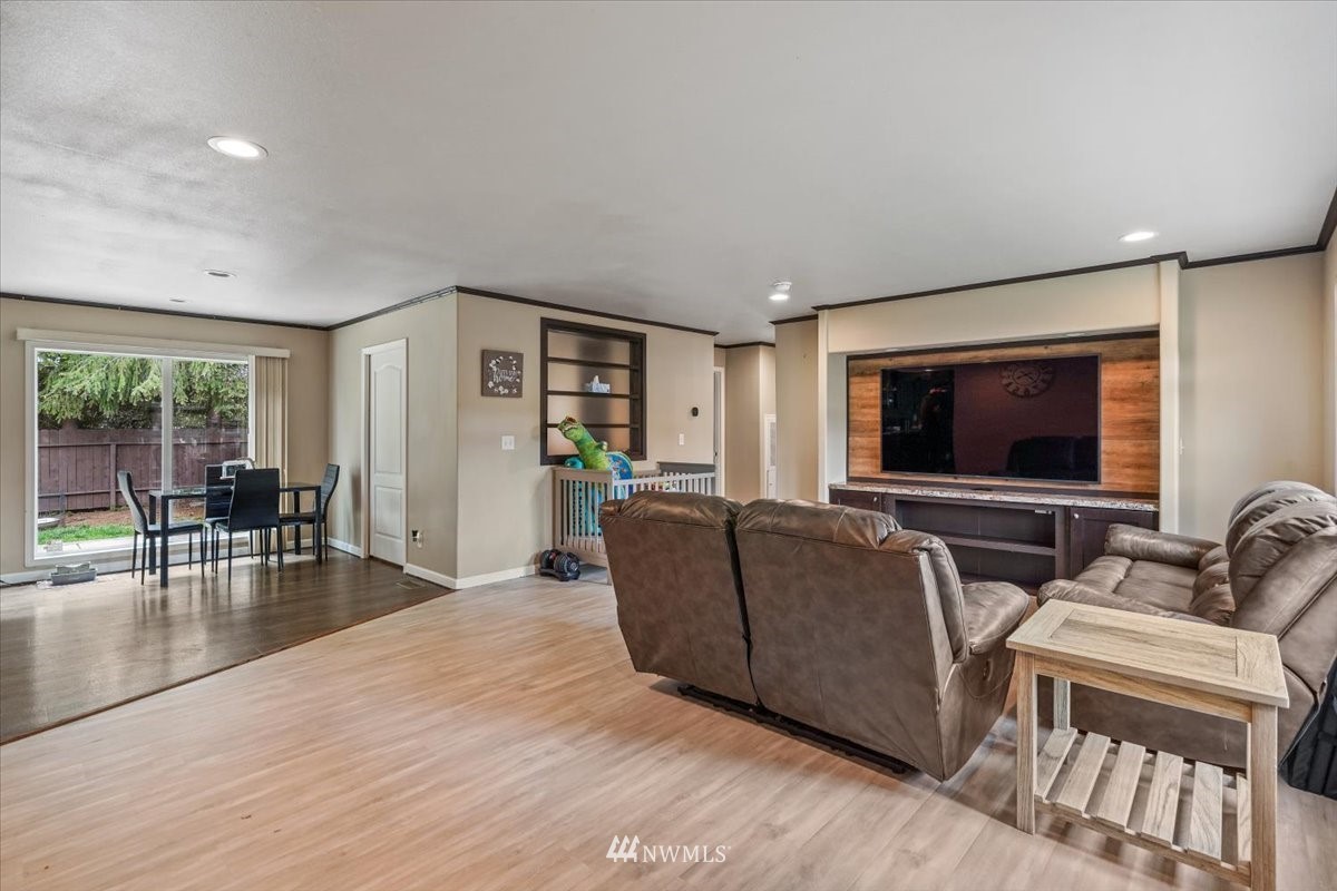 503 Maple Street Pe Ell, WA 98572 - Photo 11 of 27 a living room with furniture and a flat screen tv