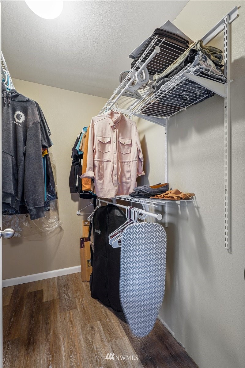 503 Maple Street Pe Ell, WA 98572 - Photo 17 of 27 a view of walk in closet with clothes