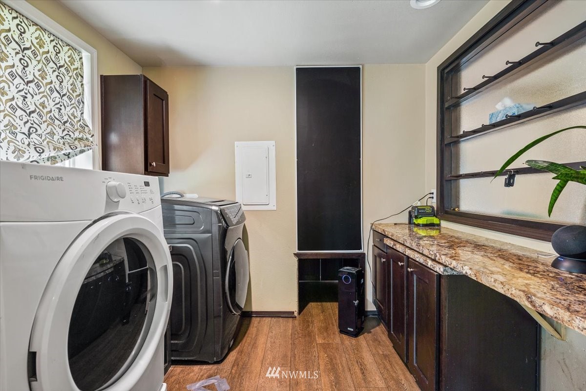 503 Maple Street Pe Ell, WA 98572 - Photo 23 of 27 a view of a kitchen with washer and dryer