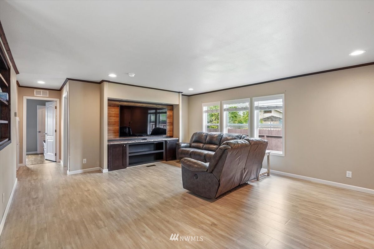 503 Maple Street Pe Ell, WA 98572 - Photo 8 of 27 a living room with furniture and a flat screen tv
