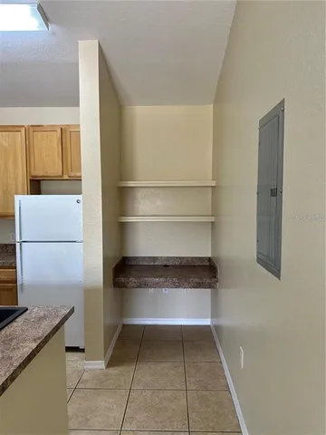a view of storage and utility room with washer and dryer