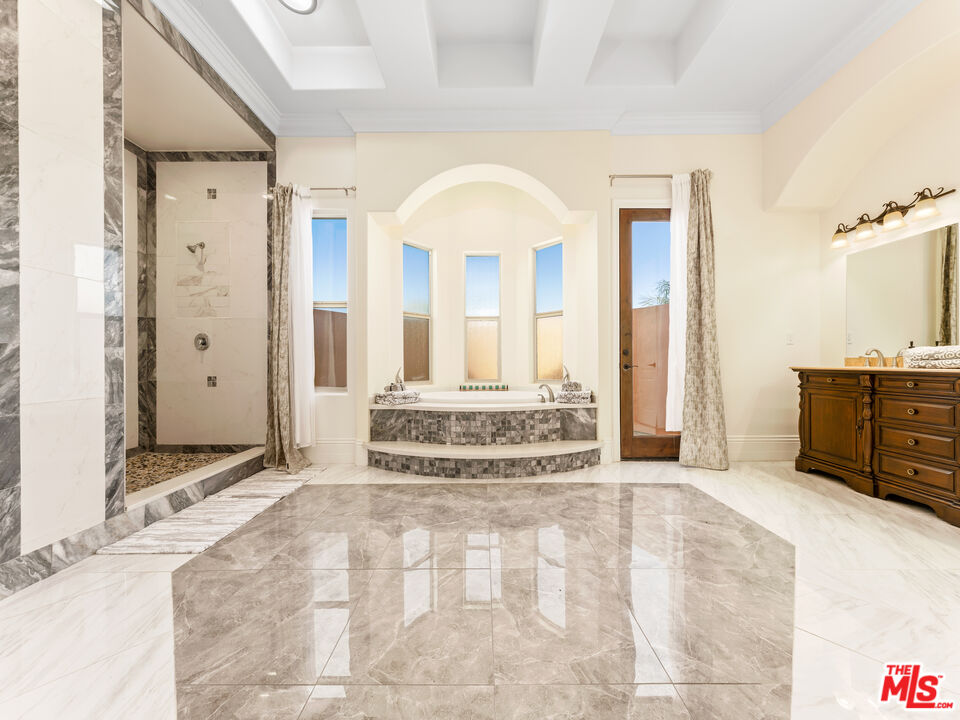 14420 Merlot Court Riverside, CA 92508 - Photo 17 of 57 a spacious bathroom with a tub shower and sink