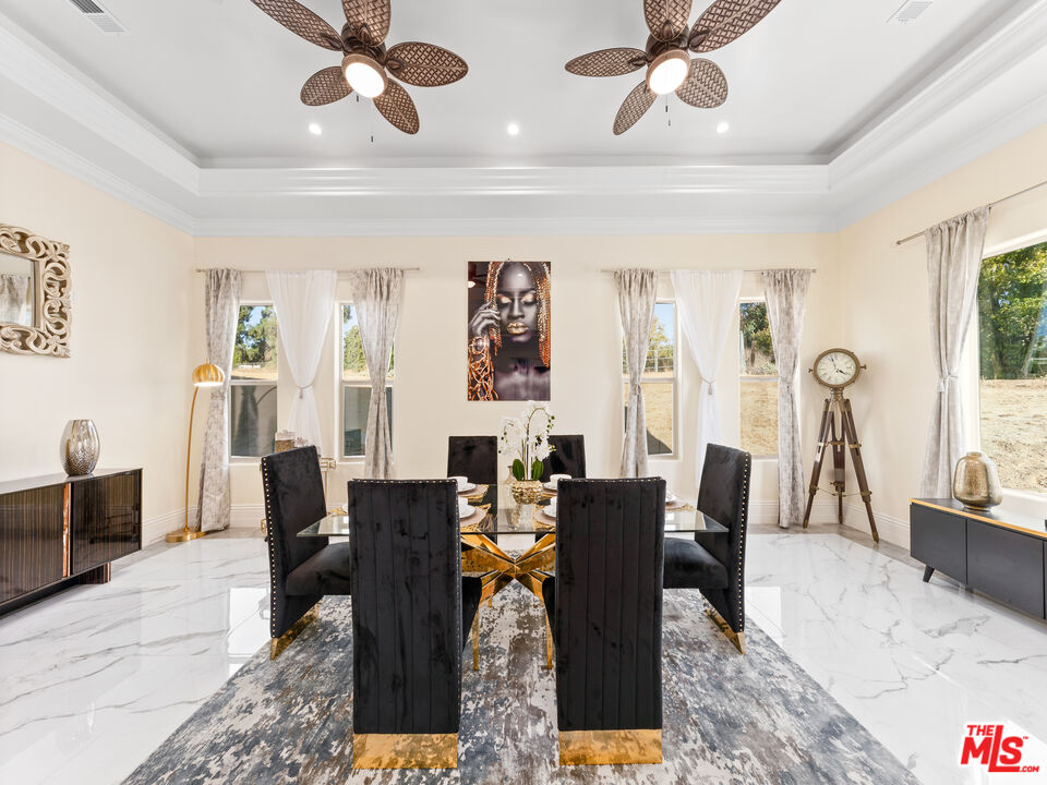 14420 Merlot Court Riverside, CA 92508 - Photo 30 of 57 a view of a dining room with furniture