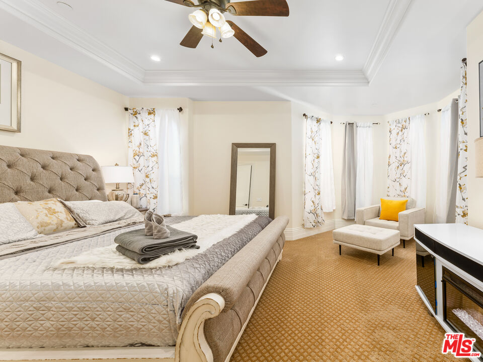 14420 Merlot Court Riverside, CA 92508 - Photo 33 of 57 a living room with furniture and a flat screen tv