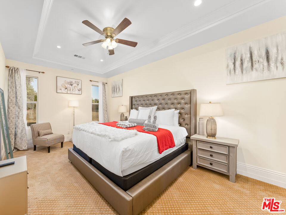 14420 Merlot Court Riverside, CA 92508 - Photo 44 of 57 a bed room with a bed and a couch