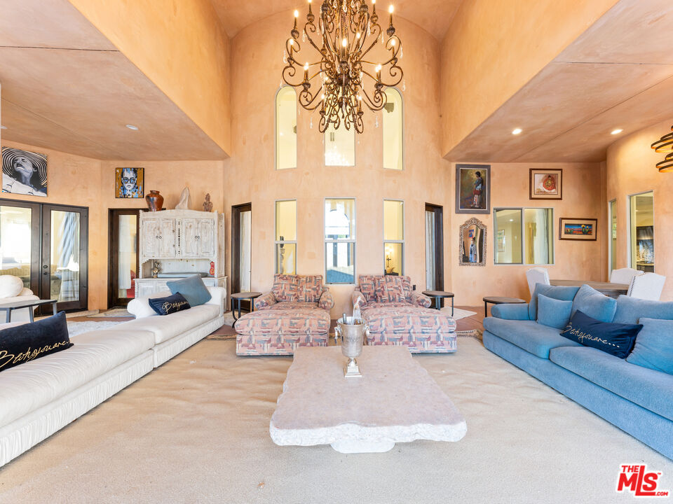 14420 Merlot Court Riverside, CA 92508 - Photo 49 of 57 a living room with furniture fireplace and white walls