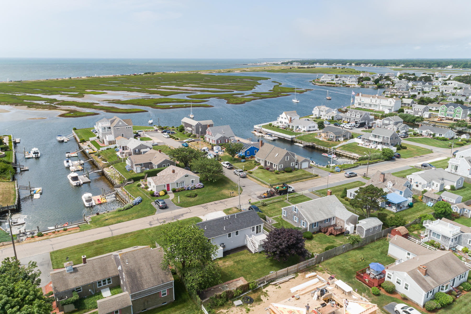 46 Surfside Road West Dennis, MA 02670 - Photo 11 of 32 an aerial view of ocean and residential houses with outdoor space