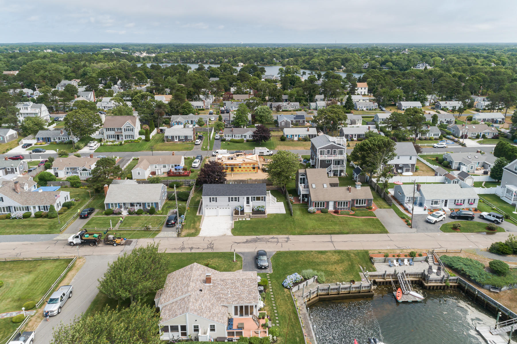 46 Surfside Road West Dennis, MA 02670 - Photo 12 of 32 an aerial view of a city with lots of residential buildings