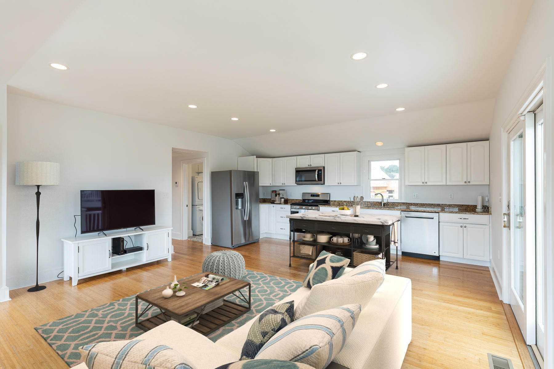 46 Surfside Road West Dennis, MA 02670 - Photo 14 of 32 a living room with furniture and a flat screen tv