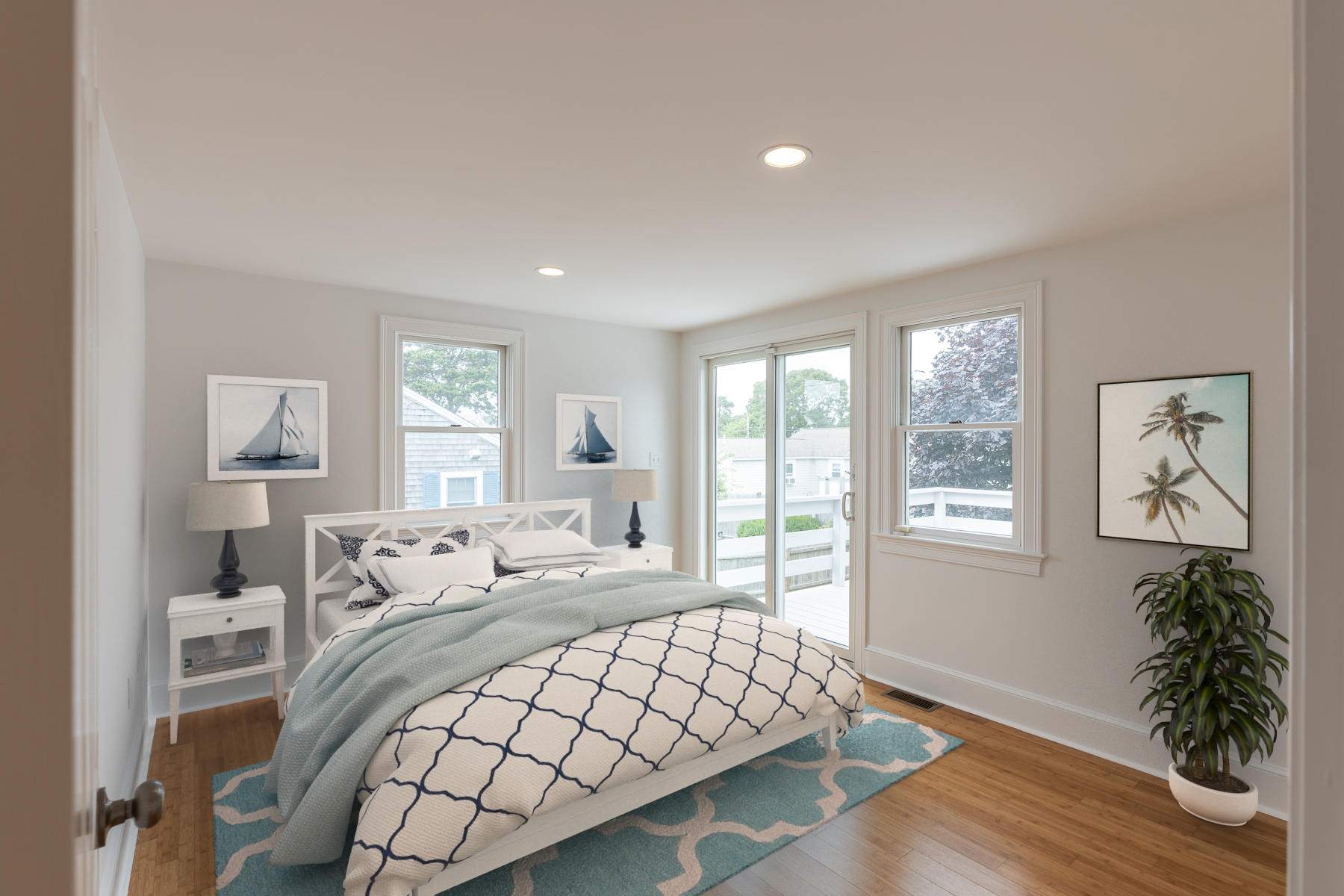 46 Surfside Road West Dennis, MA 02670 - Photo 18 of 32 a bedroom with a large bed and a window
