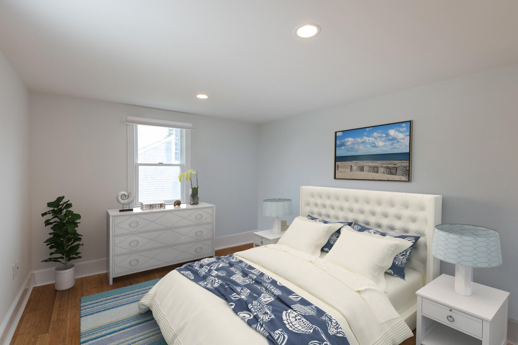 46 Surfside Road West Dennis, MA 02670 - Photo 21 of 32 a bedroom with a bed and a window