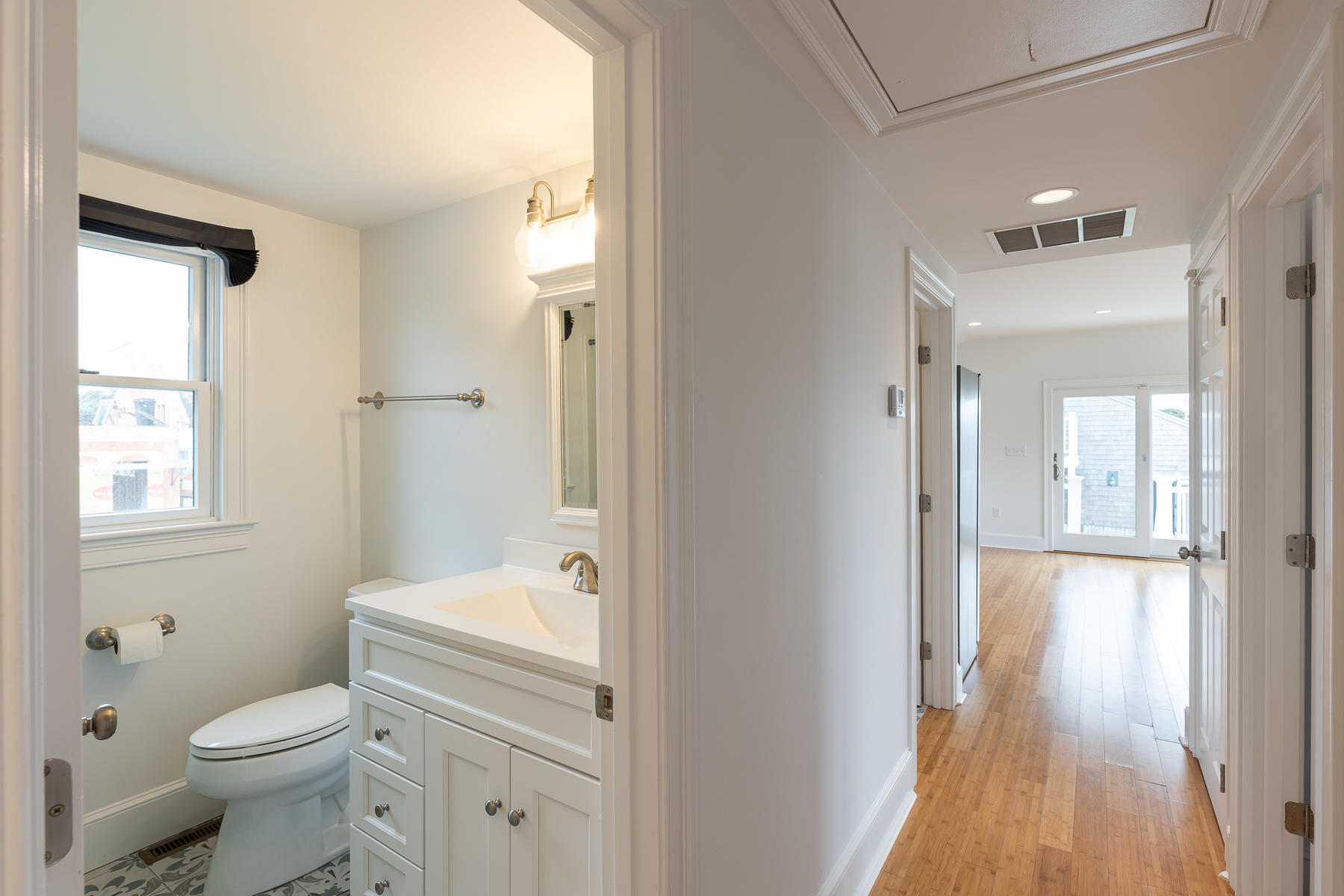 46 Surfside Road West Dennis, MA 02670 - Photo 24 of 32 a bathroom with a sink toilet and shower