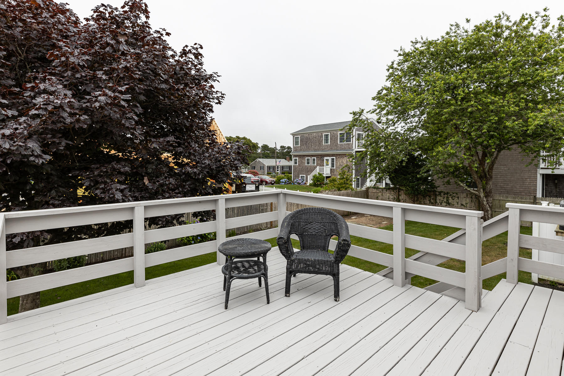 46 Surfside Road West Dennis, MA 02670 - Photo 31 of 32 a view of balcony with wooden floor and outdoor seating