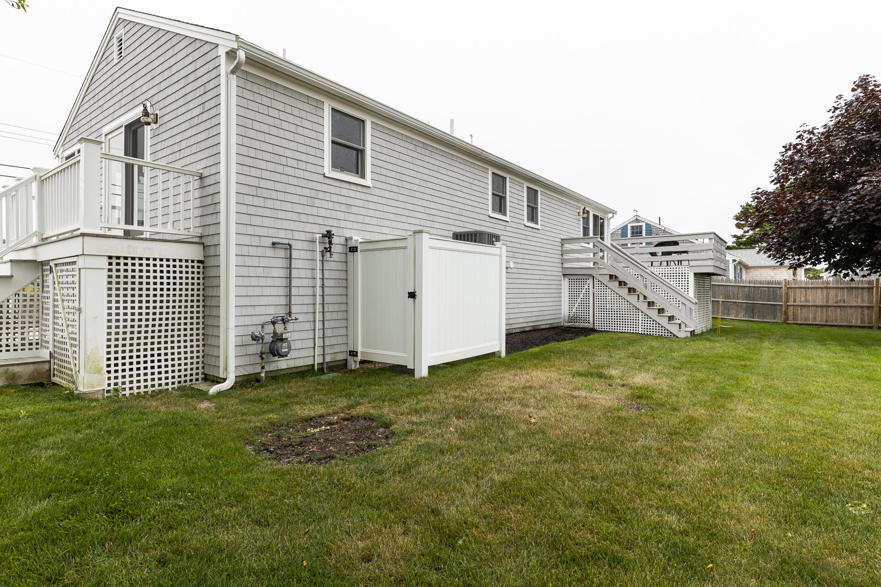 46 Surfside Road West Dennis, MA 02670 - Photo 32 of 32 a view of a house with backyard