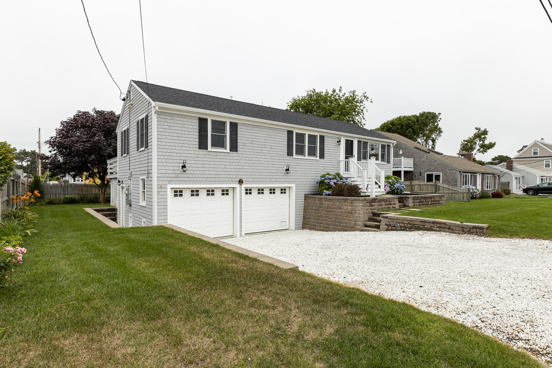 46 Surfside Road West Dennis, MA 02670 - Photo 4 of 32 a view of a house with a yard