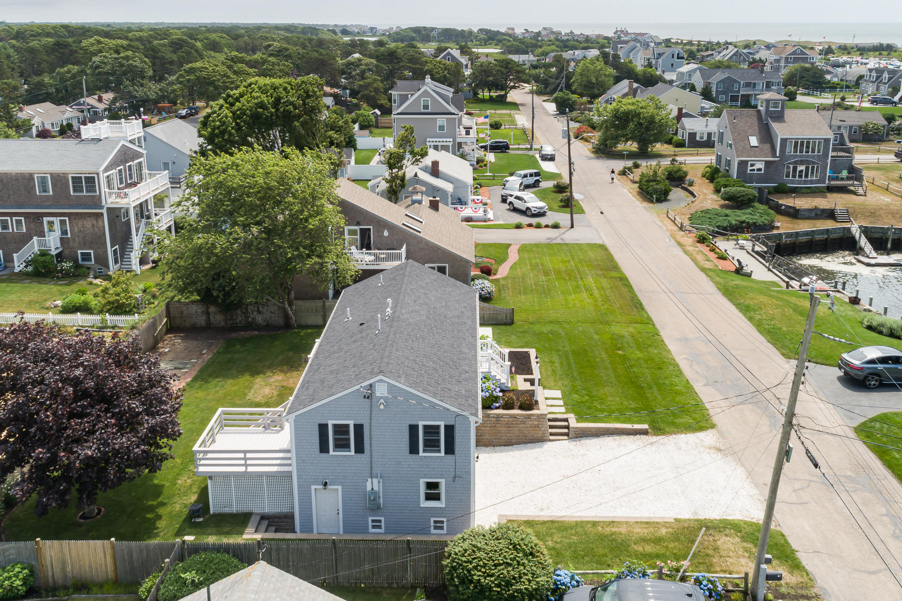 46 Surfside Road West Dennis, MA 02670 - Photo 8 of 32 an aerial view of a house