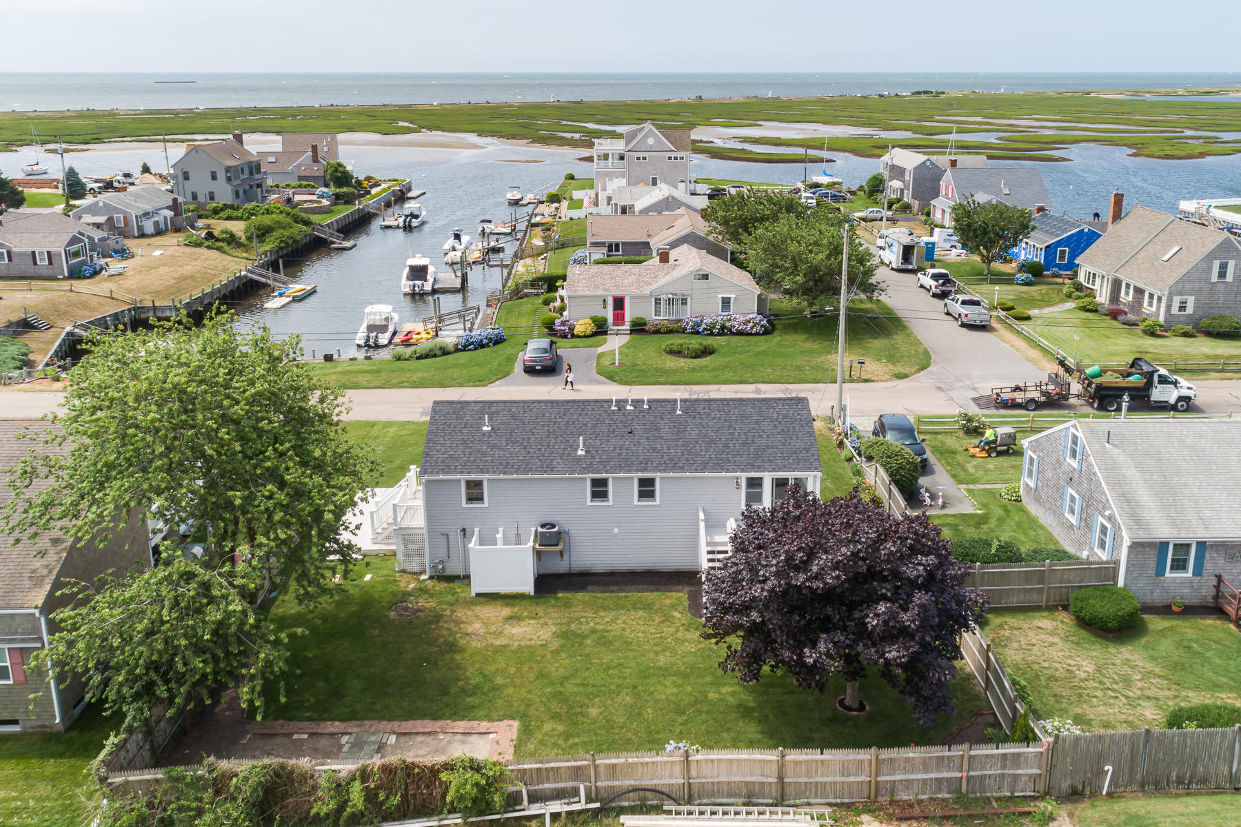 46 Surfside Road West Dennis, MA 02670 - Photo 10 of 32 an aerial view of residential houses with outdoor space and ocean view