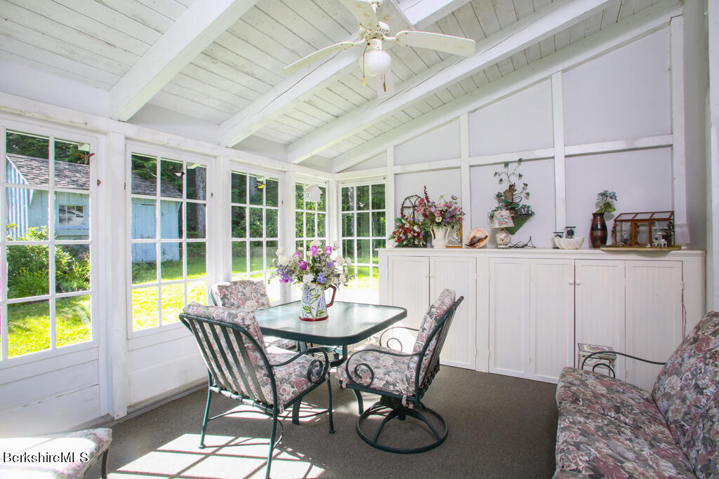 544 Tunnel Road Rowe, MA 01367 - Photo 21 of 32 a view of a dining room with furniture window and outside view