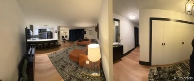 a balcony with view of living room