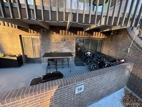 a view of a porch with furniture