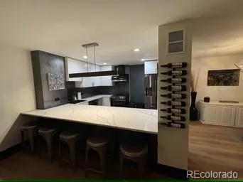 a kitchen with a table and chairs in it