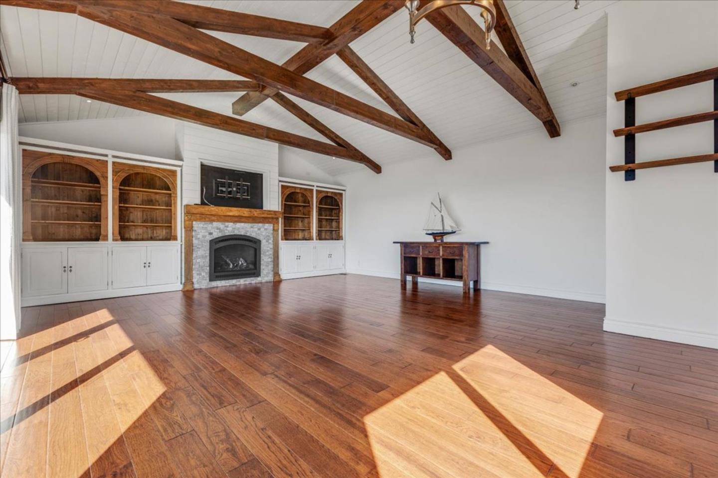 15 Mentone Road Carmel, CA 93923 - Photo 14 of 47 a living room with furniture and a fireplace
