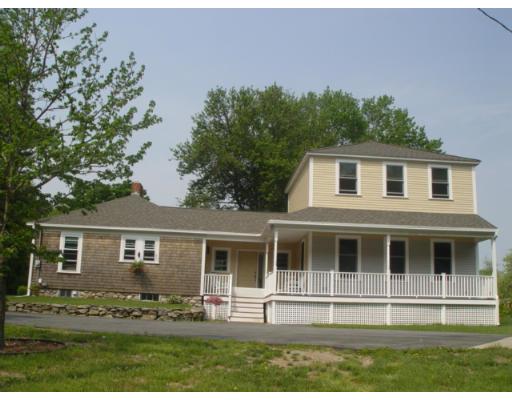 37 Robinson Road Rochester, MA 02770 - Photo 1 of 11 a house with trees in the background