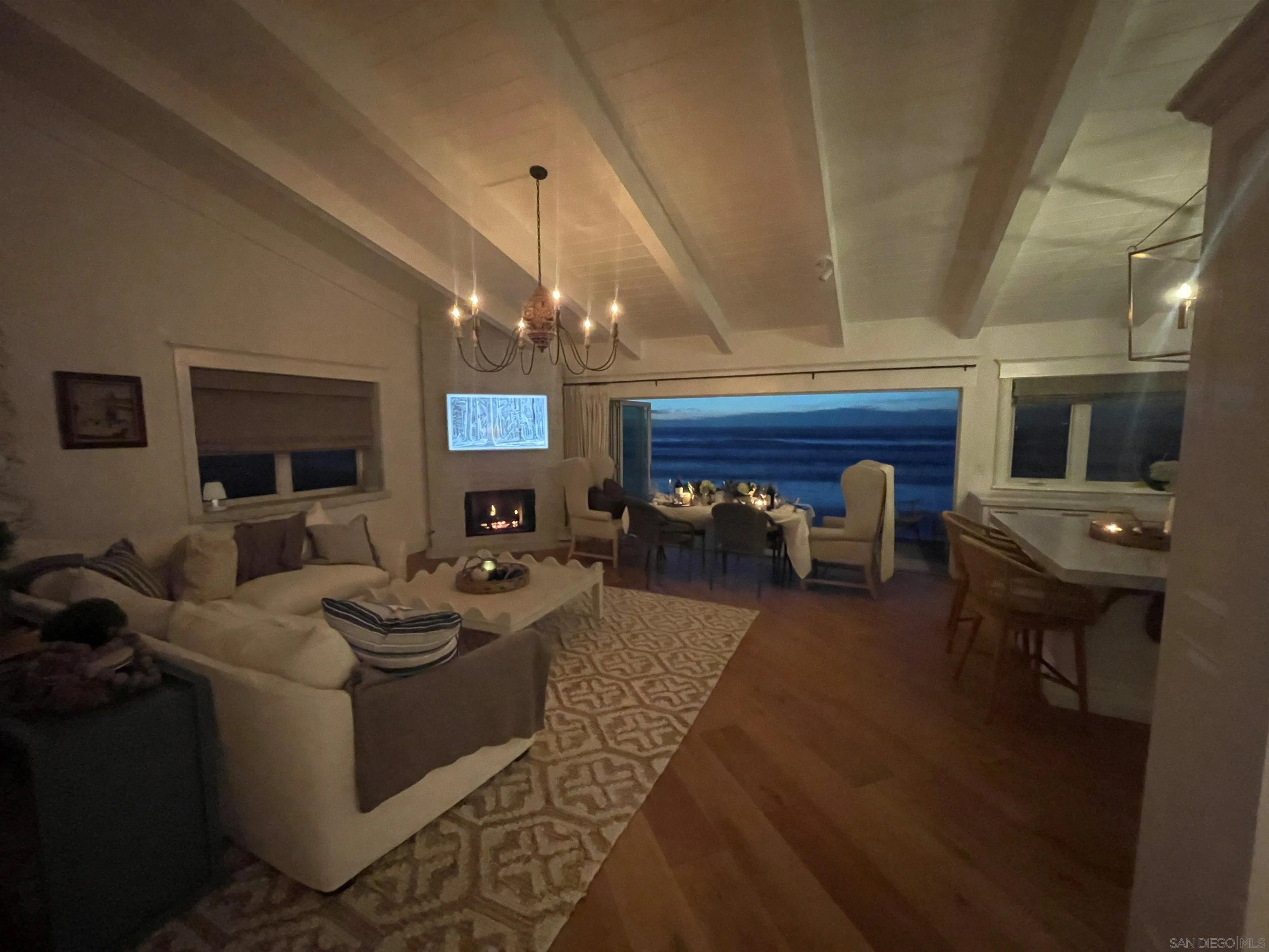 666 Ocean Lane Imperial Beach, CA 91932 - Photo 11 of 15 a living room with furniture and a fireplace