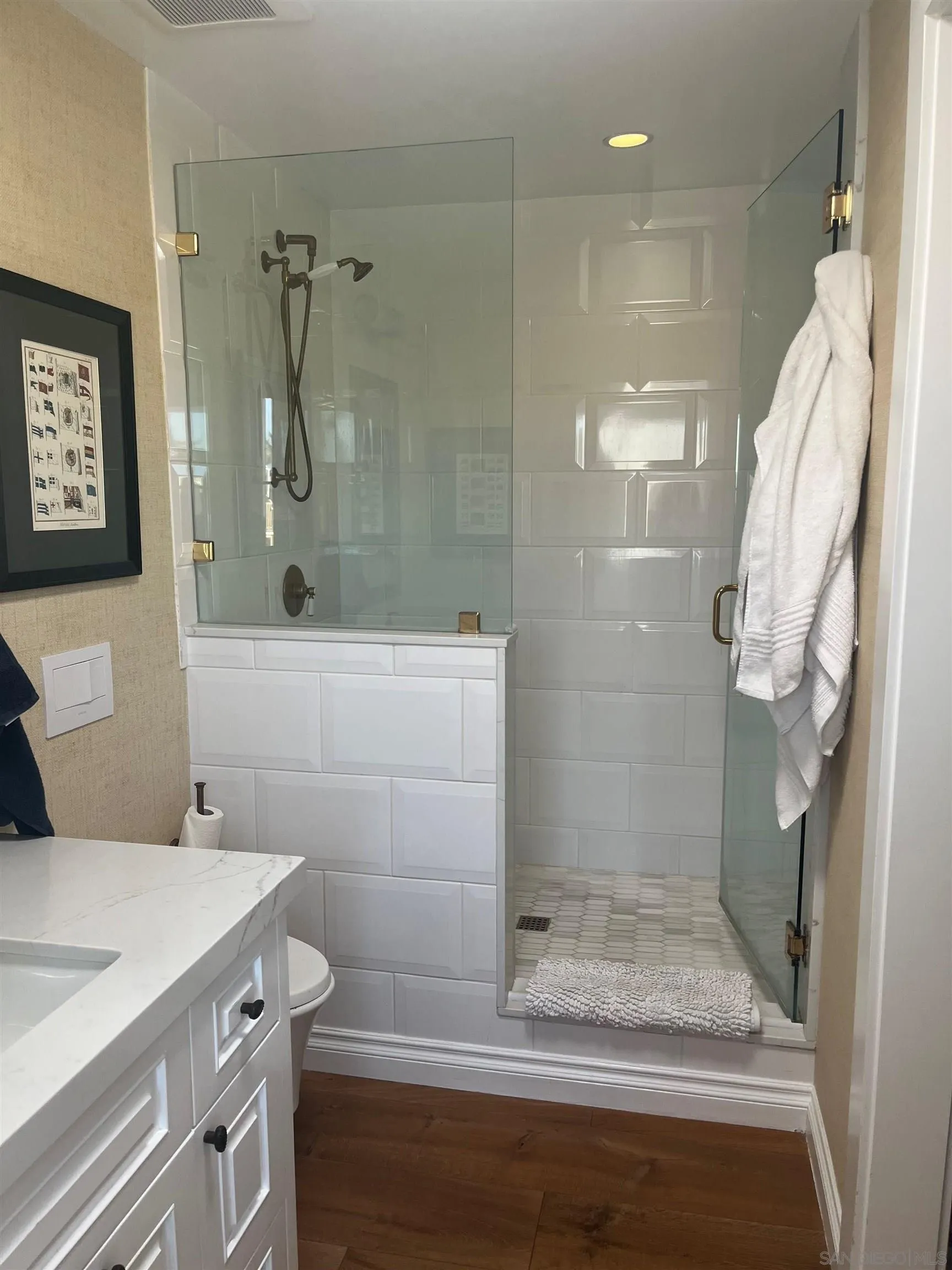 666 Ocean Lane Imperial Beach, CA 91932 - Photo 15 of 15 a bathroom with a sink a toilet and shower