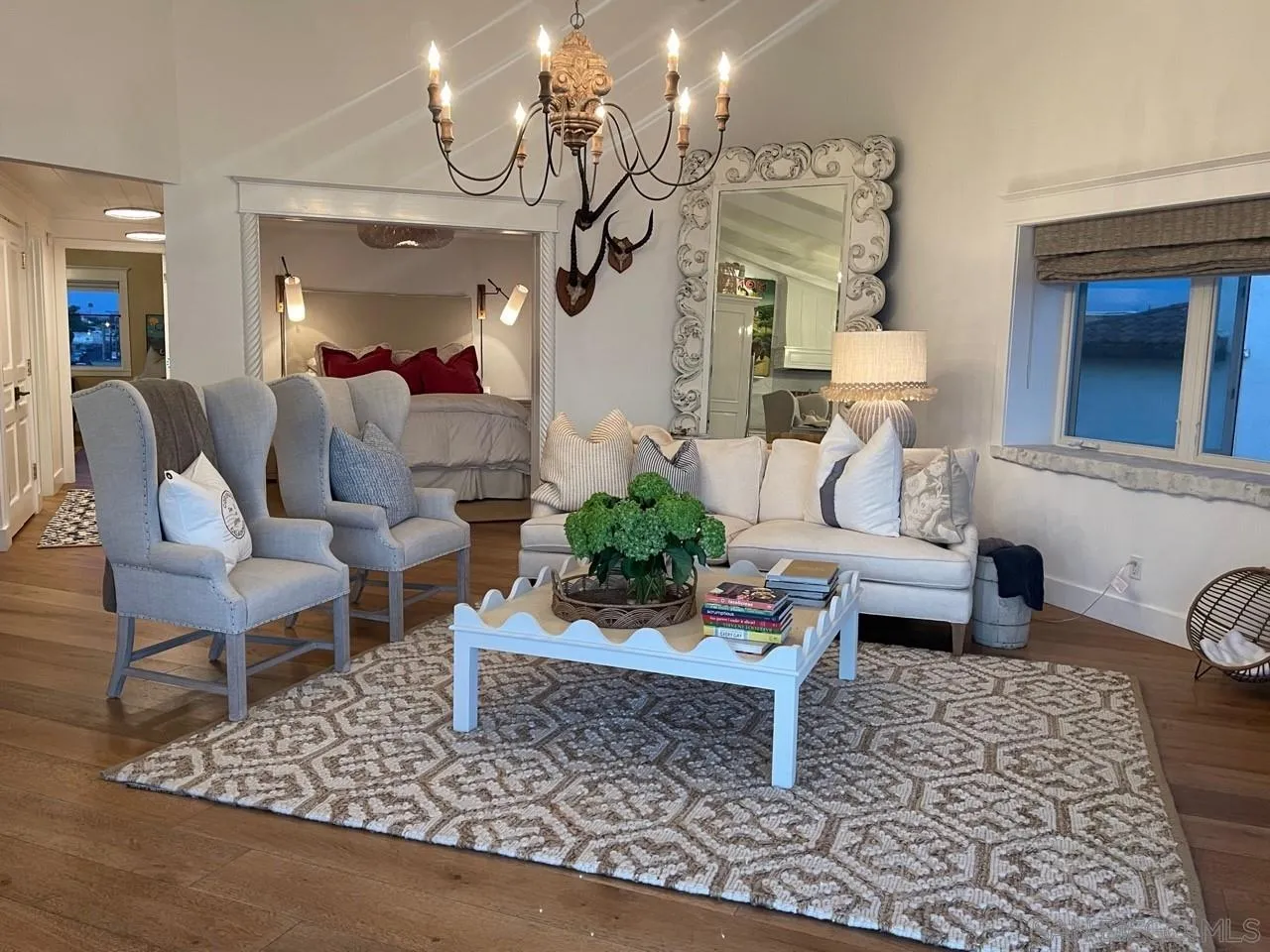 666 Ocean Lane Imperial Beach, CA 91932 - Photo 4 of 15 a living room with furniture and a chandelier
