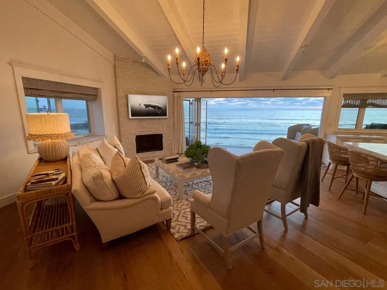 666 Ocean Lane Imperial Beach, CA 91932 - Photo 5 of 15 a living room with furniture a dining table and a flat screen tv