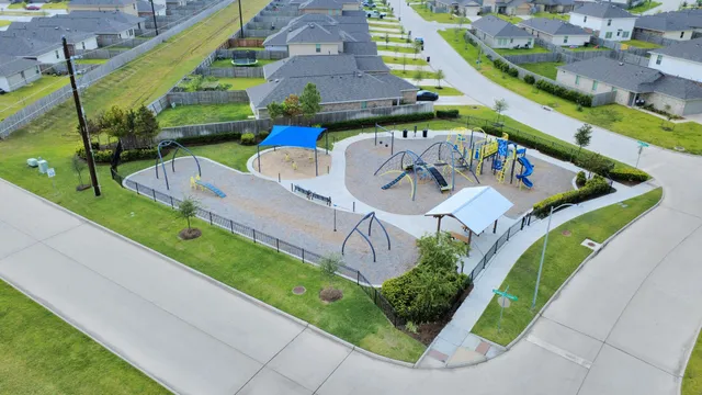 a view of a backyard with grass