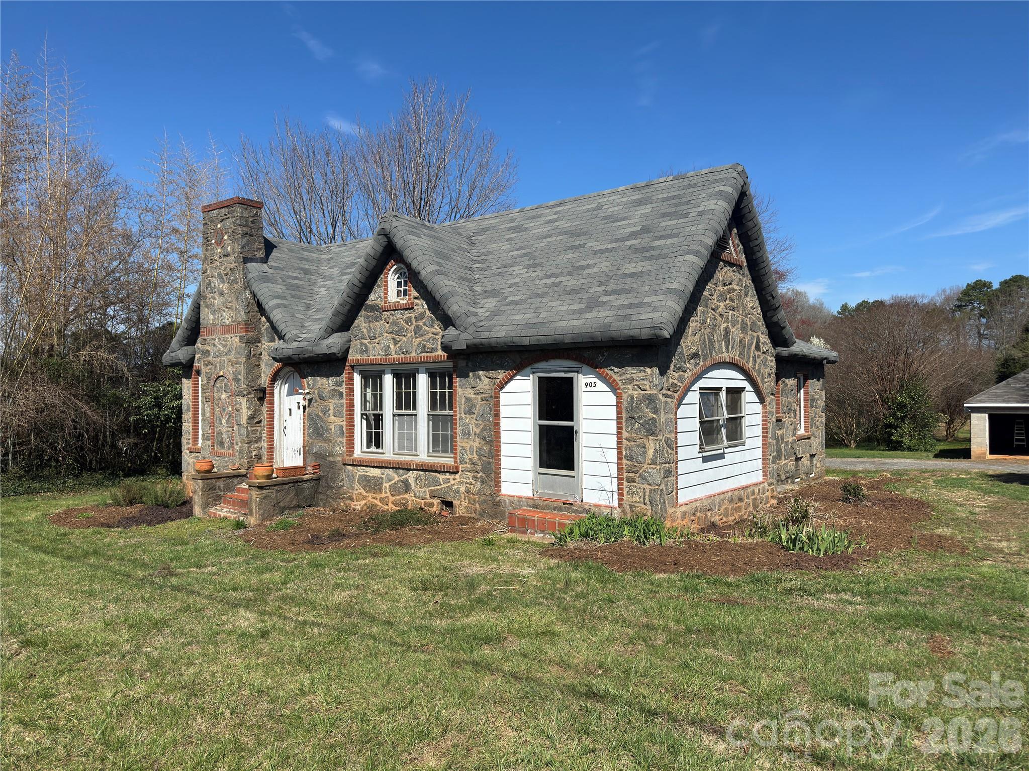 905 Conover Boulevard East Conover, NC 28613 - Photo 23 of 39 a front view of a house with a yard