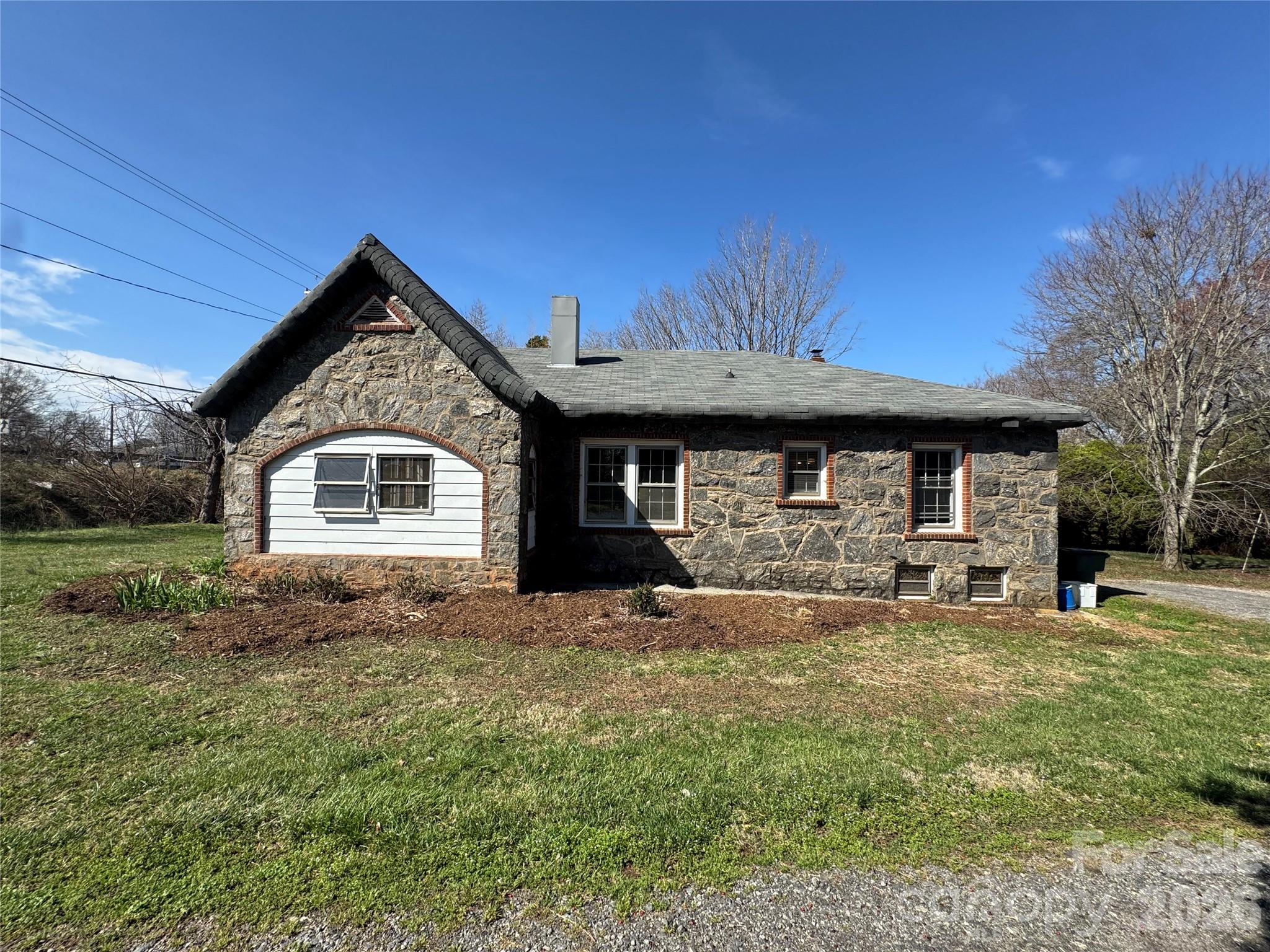 905 Conover Boulevard East Conover, NC 28613 - Photo 25 of 39 a front view of a house with a yard