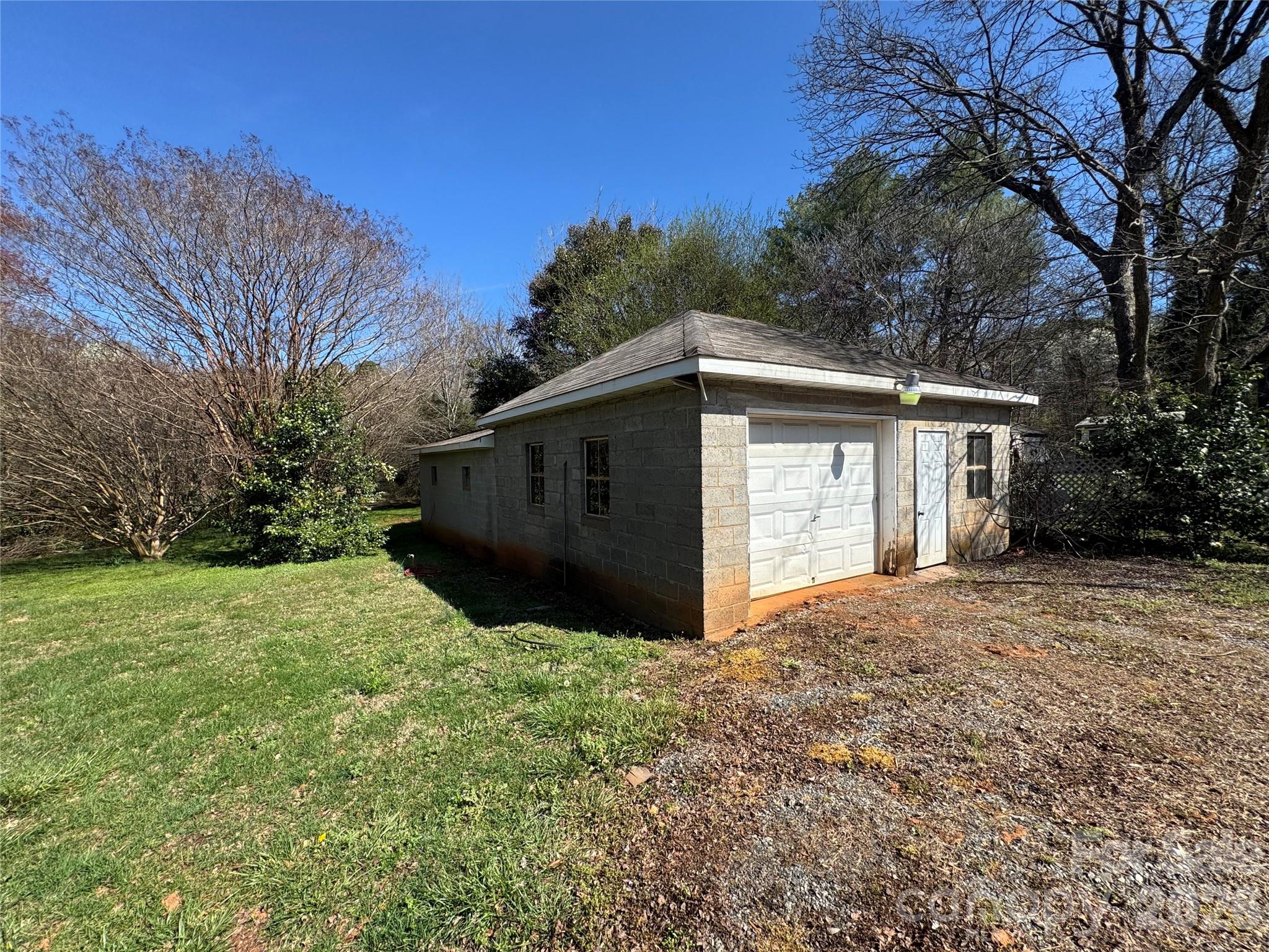 905 Conover Boulevard East Conover, NC 28613 - Photo 34 of 39 a front view of a house with yard and tree