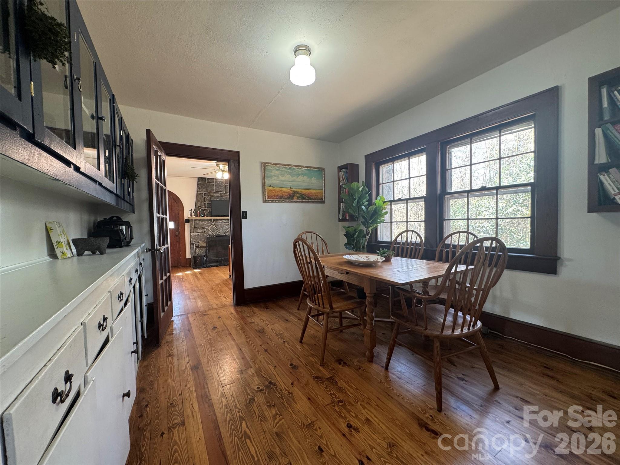 905 Conover Boulevard East Conover, NC 28613 - Photo 5 of 39 a view of a dining room with furniture window and wooden floor